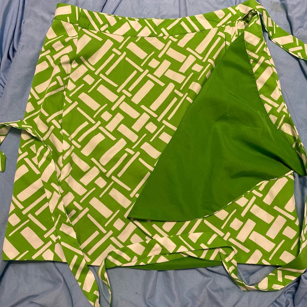 Wrap around green mini skirt